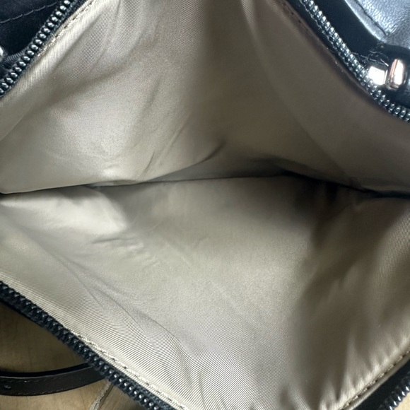 TUMI Kaylin Crossbody Nylon with leather fabric strap and leather strap. - Picture 5 of 9